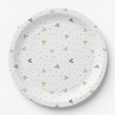 a white paper plate with mickey mouse designs on the front and sides, against a white background