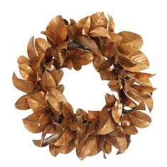 a close up of a wreath made out of leaves on a white background with clippings