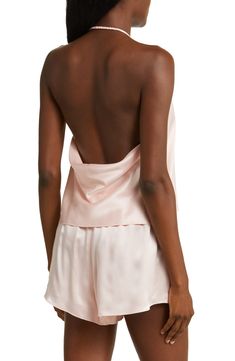 Luxuriously smooth washable mulberry silk lends endless comfort to these flowy pajamas featuring a halter-neck top and matching shorts. 10 1/2" center front top length; 2" inseam; 32" leg opening; 13" front rise; 16 1/2" back rise (size Medium) Top slips on over head; halter neck Shorts have elastic waist 100% silk Hand wash, dry flat Imported Sleeveless Silk Tops For Loungewear, Silk Tops For Summer Nights, Elegant Summer Pajama Shorts For Bedtime, Backless Summer Loungewear Sleepwear, Backless Summer Sleepwear For Loungewear, Summer Backless Loungewear Sleepwear, Silk Tops For Summer Loungewear, Silk Loungewear Tops For Summer, Sleeveless Silk Sleepwear For Summer