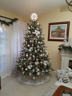 a decorated christmas tree in a living room