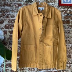 New With Tags, Never Worn. Size Xs. True To Size. Color Is Burnt Honey, Which Is A Sort Of Yellow Ochre. A Take On The Classic French Worker’s Jacket, This Three-Pocket Lightweight Layer Is Made To Bridge The Seasons: Wear It Now (Over A Cashmere Turtleneck) And Later, Unbuttoned Over A Baby-Sleeve Tee. It’s Made From Garment-Dyed Cottonan Alex Mill Favoritewhich, If You Didn’t Know, Only Gets Cooler And More Faded Over Time, So...Wash And Wear It As You Please. 100% Cotton Machine Wash Yellow Cotton Long Sleeve Outerwear, Casual Mustard Cotton Outerwear, Mustard Cotton Outerwear For Fall, Casual Yellow Cotton Outerwear, Casual Yellow Long Sleeve Outerwear, Yellow Relaxed Fit Outerwear For Fall, Yellow Spring Outerwear With Pockets, Spring Yellow Outerwear With Pockets, Casual Yellow Relaxed Fit Outerwear