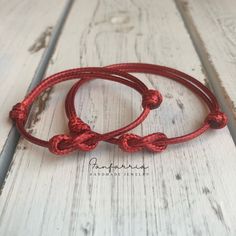 "These lovely bracelets were made using red waxed cord. Designed for everyday wear. The bracelets are adjustable. The adult bracelet opens to around 9\" and closes to 6. The kid bracelet opens to around 7\" and closes to 4\". Please feel free to contact me if you have any questions Check for more Mommy and Me Bracelets https://www.etsy.com/shop/Fanfarria?section_id=16952652&ref=shopsection_leftnav_2 Check for Hemp Jewelry: https://www.etsy.com/shop/fanfarria?section_id=16963242&ref=shops Mommy And Me Bracelets, Bracelets Kids, Eternity Knot, Family Bracelets, Hemp Jewelry, Kids Bracelets, Knot Design, Red Bracelets, Knot Bracelet