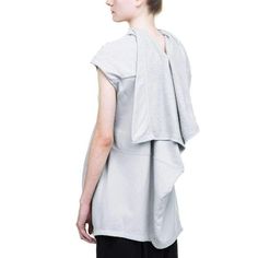 Pelican tunic in dinge cotton featuring a loose fit, v-shaped drapage in front and a high collar with draping in the back. 100% cotton Machine wash Designer color: Dinge Made in Italy Asymmetrical Cotton Top For Daywear, Cotton Asymmetrical Top For Daywear, Cotton Lagenlook Tops For Daywear, Long Cotton Skirt, Panel Jacket, Tunics Online, Black Leather Wedges, Rick Owens Drkshdw, Leather Wedge Sandals