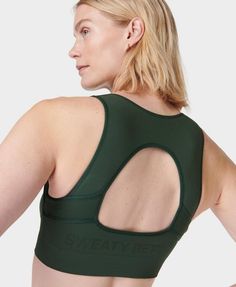 A feminine sports bra that's perfect for yoga, Pilates or barre. Made from 4-way stretch, sweat-wicking and quick-drying fabric. Features a soft V-neckline and chest cut out and an open race back. Signature branding on the underband. Made from the same yarn as our Stamina style. Centre front length: 13.5cm / 5”. Model wears size S and is 178cm/5'10" tall. Style Code: SB9905Colour: Trek Green Sweaty Betty, Running Jacket, Long Crop Top, Sleek Fashion, Casual Coat, Bottom Clothes, Leggings Shop, Hoodie Top, Casual Jacket