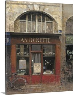 an old building with two bicycles parked outside