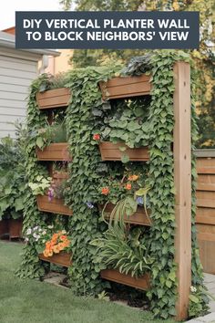 a vertical planter wall with plants growing on it and the words diy vertical planter wall to block neighbor's view