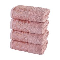 four pink towels stacked on top of each other