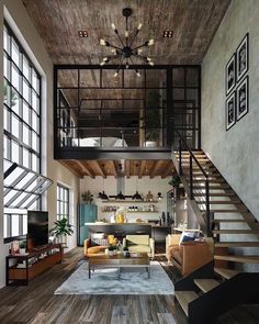 a living room filled with lots of furniture and a staircase leading up to the top floor