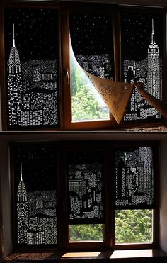 the window is decorated with black and white cityscapes