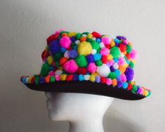 Pom Pom Top Hat great for any occasion, party, costume, etc.! Fun Party Costume Hat With Curved Brim, Fun Carnival Costume Hat, Fun Hats For Carnival Costume, Fun Costume Hats With Curved Brim For Parties, Fun Brimmed Costume Hats For Parties, Multicolor Novelty Party Hat, Novelty Multicolor Party Hats, Fun Party Mini Hat With Curved Brim, Fun Summer Hats For Costume Party