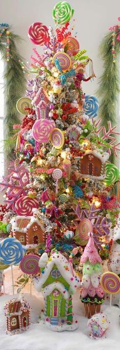 a christmas tree decorated with candy and lollipops