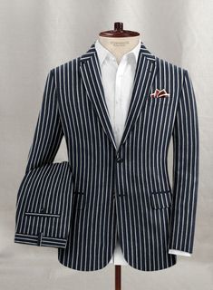 Establish your uber-stylish persona with our Solbiati Linen Pelar Suit, which will be timeless addition this summer. Crafted with linen, our suit is woven in white stripes pattern with a dashing blue hue creating a look for you to be more admirable. Meanwhile, the linen gives you comfort all day long without losing your cool. So boost your attire with our suit that provides a never-ending style in your wardrobe. 
 
 Look Includes  Solbiati Linen Pelar Fabric  Two Button Jacket Style  Notch Lapel Button Jacket, Jacket Buttons, Black Button, Blue Hues, Losing You, Jacket Style, Stripes Pattern, This Summer, Horn