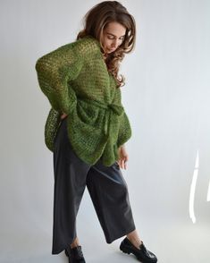 Hello, I'm the one, who won't let you down - green mohair cardigan. I will comfort you, keep you warm and will make you smile. I'm 100% hand made and proud of that. I consist of 80% italian kid mohair and 20% of nylon, which makes me incredibly natural. I'M AVAILABLE IN OTHER COLOURS I'm quite unique as could be worn all year long. I'm in one size and one size fits all because my measurements are : ❤️ Width -52 cm ❤️ Lengths -65 cm If you would like me in other size, you could request a custom o Green Mohair Winter Cardigan, Oversized Open Knit Green Sweater, Oversized Green Open Knit Sweater, Green Chunky Knit Cardigan For Spring, Oversized Green Chunky Knit Cardigan, Wedding Cardigan, Cardigan Short, Cardigan Kimono, Light Cardigan