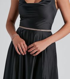 Dazzle up your outfits with a rhinestone belt that brings the glitz and shine. It features three rows of varying-sized glimmering rhinestones linked together with a chain and an adjustable lobster clasp closure. Add this dainty belt to a chic jumpsuit to create a flattering cinched look and complete with a sleek clutch.Fit & FeaturesThree rows of rhinestonesAdjustable lobster clasp closure Elegant Evening Belts With Rhinestones, Fitted Rhinestone Belts For Party, Adjustable Chain Belt For Formal Occasions, Adjustable Rhinestone Party Belts, Adjustable Metal Party Belt, Elegant Adjustable Belt With Rhinestones, Rhinestone Chain Belt For Party, Elegant Rhinestone Belts For Formal Occasions, Gold Rhinestone Party Belt