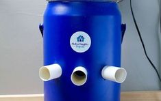 a large blue water container with two eyes on it