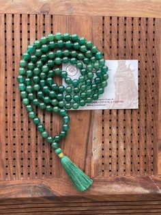 This is a divine, blessed and energised handmade natural green jade stone mala.  Green Jade is a stone that will help you in the manifestation of your dreams into reality.  It is considered as one of the lucky stones usually bringing peace and harmony in ones life. Length: 18 inches approx  Please note slight variations in color, shape, size, texture of beads, threads, string and tassel do occur Return policy  We offer 100% money back, No questions asked, Bid with confidence. Contact us within 14 days of delivery  Ship items back within 30 days  Request a cancellation within 4 hours of purchase.  Buyers are responsible for return shipping cost. All our spiritual products are products spiritually activated with mantras and pujas also known as abhisheka by our priest without any extra charge Hand Wrapped Green Beads As Gift, Hand Wrapped Green Beads For Gift, Spiritual Green Hand Wrapped Beads, Spiritual Jade Beads For Meditation, Green Spiritual Beads For Healing, Green Spiritual Beads, 108 Count, Green Hand-strung Spiritual Mala, 8mm Jade Beads For Spiritual Use, Green Gemstone Beads Mala For Healing