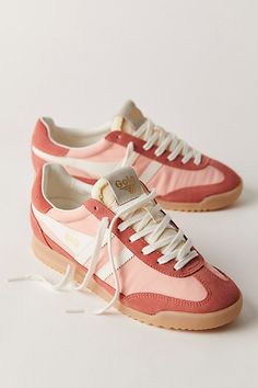 Nylon uppers and suede overlays give this tapered sneaker from Gola the perfect textured touch. **Features:** Low-top style, nylon uppers, suede overlays, side stripes, gum rubber outsole, toothed tread, lace-up closure **Why We | Gola Firefly Sneakers at Free People in Pale Pink/Clay/Off White, Size: US 6 Pink And Brown Sneakers, Womens Sneakers Outfit, Pink Sneakers Outfit, Womens Pink Sneakers, Gola Sneakers, Easy Shoes, Fun Sneakers, Sneaker Outfits Women, Cute Sneakers