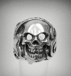 Sterling silver biker ring, skull guitar - 925/1000. Stamped 925.Approximate weight 15.3 grams. Top width 2.2 cm (0.84 inches). All our jewels are made from solid sterling silver 925/1000 and are carefully crafted by hand in our family workshop. We dispatch your orders in 5 working days, worldwide and the postage is $5. We ship registered priority mail. Please allow 5-7 working days for delivery in Europe and 10-15 working days outside Europe. For any questions - please do not hesitate to contac Silver Skull Ring For Halloween Streetwear, Silver Skull Ring For Biker Events And Halloween, Punk Sterling Silver Skull Ring, Sterling Silver Skull Ring In Punk Style, Silver Punk Skull Ring, Silver Skull Ring For Streetwear, Silver Punk Rings With Skull Print, Silver Skull Ring Punk Style, Silver Skull Ring In Punk Style