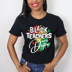 Attention all passionate educators! Get ready to showcase your pride and style with our extraordinary Black Teacher Shirt. Crafted from 100% Airlume combed and ringspun cotton, this light fabric shirt offers unrivaled comfort and breathability. Designed with a retail fit, our Black Teacher Shirt hugs your curves in all the right places, flattering your figure while keeping you cool and comfortable throughout the day. No more annoying tags to deal with, as our tear-away label ensures a seamless, Black Text Print Top For Back To School, Black Top With School Spirit For Back To School, Black Tops With School Spirit For Back To School, Black Tops For Back To School With School Spirit, Black Top With Text Print For Teaching, Black Text Print Top For Teaching, Casual Black Tops For Back To School, Casual Black Top For Back To School, Custom Print Black Top For Teacher Appreciation