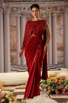 Red pre-draped saree with placement scallop trimmed embroidery. Paired with a blouse and belt. Comes along with an asymmetric cape with sequins butti embroidery and scallop trims, elevated with stone danglers. - Aza Fashions Semi-stitched Draped Saree For Evening, Party Saree With Cutdana And Draped Style, Red Dupatta For Evening With Traditional Drape, Red Evening Dupatta With Traditional Drape, Draped Party Wear Blouse Piece For Diwali, Red Evening Dupatta In Traditional Drape, Draped Blouse Piece For Diwali Party Wear, Party Wear Dupatta For Diwali, Draped Style, Diwali Party Wear Draped Blouse Piece