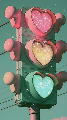 a traffic light that has hearts on it