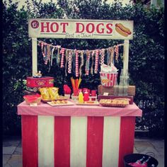 a hot dog stand is set up outside