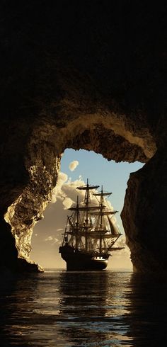 a pirate ship sailing through an opening in the ocean