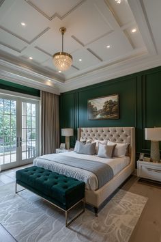 a large bedroom with green walls and white carpeted flooring, along with a bed that has a tufted upholstered headboard