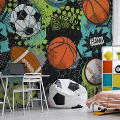 a room with sports themed wallpaper and colorful accessories on the floor, including a bean bag chair