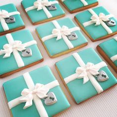 some cookies that have been decorated with blue and white icing