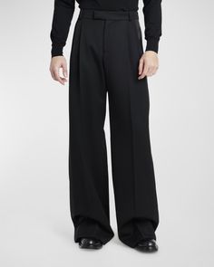 Alexander McQueen solid trousers with tonal satin side stripes    Mid rise    Doublepleated front    Side slip pockets    Buttoned welt pockets at back    Full length    Baggy legs    Wool    Dry clean    Made in Italy Mens Tie Outfits Business Casual, Wool Pants Mens, Flared Dress Pants Men, Double Pleated Trousers Men, Man Pants Fashion, Baggy Trousers Outfit Men, Mens Black Trousers, Black Baggy Trousers, Baggy Suit Pants