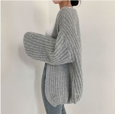 This Lantern Sleeve Knit Cardigan will keep you stylish and warm! Size Chart: Size Bust (cm) Shoulder (cm) Sleeve (cm) Length (cm) Bust (in) Shoulder (in) Sleeve (in) Length (in) One Size 124 58 47 64 48.82 22.83 18.50 25.20 Description: Yarn Thickness: Coarse YarnThickness: StandardSleeve Style: RegularSleeve Length(cm): FullPercentage of Material: 51%-70%Pattern Type: SolidPattern: Loose-FittingOrigin: CNMaterial Composition: AcrylicMaterial: AcrylicFit Type: Loose FitElasticity: High StretchC Balloon Sleeve Cardigan, Estilo Harajuku, Loose Knit Cardigan, Fall Streetwear, Vintage Knitwear, Elegant Sweater, Cardigan Casual, Winter Vest, Cardigan Sweater Coat