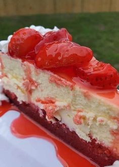 a piece of cheesecake with strawberries on top