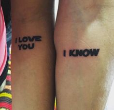 two people with tattoos on their arms that say i love you and i know not