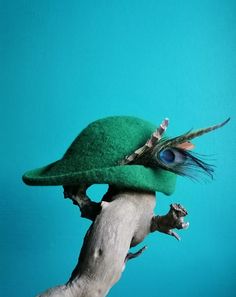 I make this hat from sheep's wool using the felting method as a variant of the medieval Tyrolean hat, hunting hat, Robin Hood hat. The hat is suitable for a head circumference of 56-59 centimeters.The hat comes with a bundle of feathers. if you want a certain color, or a combination of two colors, or the edge of the hat is not even, but carved, write me about it in personal messages. Robin Hood Hat, Hat With Feather, Hood Hat, Hunting Hat, Blue Hat, Costume Hats, Green Wool, Robin Hood, 14th Century