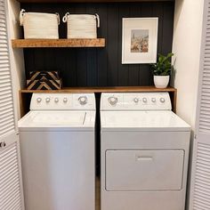 a washer and dryer in a small room with open shelving on the wall