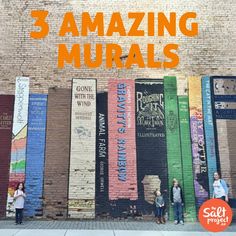 people are standing in front of a wall with books on it and the words, 3 amazing murals