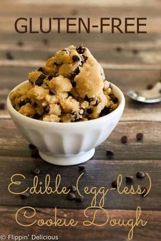 a bowl filled with cookie dough on top of a wooden table