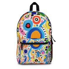 "🌈✨ Discover the Magic of Art and Color with our Unique Backpack! 🎒🎨 This vibrant and playful backpack is a true celebration of creativity and style, perfect for those who love to stand out. Decorated with an array of colorful circles and intricate designs, it's a piece that celebrates the whimsy of kidcore. 🔹 Design Inspiration: Drawing inspiration from a diverse range of artistic movements and styles, this backpack is a fusion of colorful cartoon charm, the historical richness of the Barbi Fun Multicolor Standard Backpack, Fun Multicolor Student Backpack, Fun White Standard Backpack, Fun Multicolor Backpack For Travel, Fun Multicolor Backpack, Multicolor Standard Backpack, Fun Multicolor Backpack For Back To School, Fun White Travel Backpack, Multicolor Softback Backpack For Students