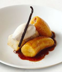 bananas and ice cream on a white plate