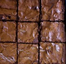 some brownies are cut into squares and sitting on a table