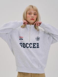 Editor’s notesThis is a soccer logo half zip-up sweatshirts with a solid texture and moderate thickness made of cotton. The lettering printing and logo emblem design in the front add sporty sensibility. Loose fit and half zip-up design for comfortable and casual styling.- Casual drop shoulder- Suitable length and half zip-up design- Sporty lettering print- Good to coordinate with various bottoms Measurements(in.)Size (S/L)- Total Length: 24.8 in. / 28.35 in.- Shoulder: 24.41 in. / 24.4 Sporty White Track Jacket With Letter Print, Sporty Logo Print Sweatshirt For Leisure, Sporty Sweatshirt With Logo Print For Leisure, White Sporty Half-zip Sweatshirt, Sporty Half-zip Tops For College, White Half-zip Sporty Sweatshirt, Sporty Letter Embroidery Sweatshirt For Sports Events, Sports Cotton Track Jacket With Letter Print, Cotton Sports Track Jacket With Letter Print