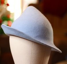 blue witch / wizard inspired hat in the Beauxbatons hat style. Hand made, this felt hat, and they are 2 available sizes, M and L M is for heads around 52-54 CM (opt 28CM) L size is for heads around 56-58 CM (opt. 33CM) Winter Costume Felt Hat With Curved Brim, Curved Brim Felt Hat For Costume In Winter, Fitted Blue Felt Hat For Winter, Blue Witch Hat, Handmade Felt Hats, Magical Fashion, Blue Witch, Hat French, Wizard Hat