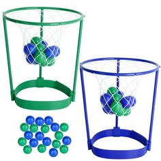 two plastic balls in a net and some blue and green balls