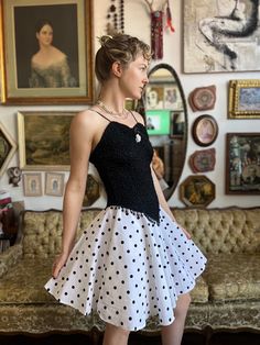 This 80s Vintage Polka Party Dress is perfect for any occasion. The size M features a smoked top and a flared polka bottom, giving it an eye-catching and unique look. Stylish and fashionable, you'll be sure to stand out in this dress. Size: Medium Chest: 32” Waist: 30” This is a preloved item. Fitted Retro Mini Dress For Parties, Retro Polka Dot Dresses For Party, Summer Party Vintage Fit And Flare Dress, Summer Party Fit And Flare Vintage Dress, Vintage Polka Dot Mini Dress, Vintage Mini Dress In Polka Dot, Party Vintage Mini Dress With Ruffles, Party Mini Vintage Dress With Ruffles, Vintage Ruffled Dress With Fitted Bodice For Party