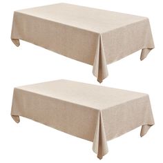 two beige linen tablecloths on top of each other