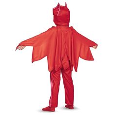 a little boy in a red costume standing with his arms out and hands on his hips