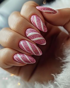 Experience the charm of Artistic Wonderland Nails with pastel pink as the base, accented by elegant white spiral stripes reminiscent of candy canes. This chic and festive Christmas nails design combines softness and modern elegance, perfect for spreading holiday cheer. Let your nails make a sweet and stylish statement this season!  #ArtisticWonderlandNails #ChristmasNails #CandyCaneNails #PastelNailArt #FestiveNailDesign #HolidayNailInspo #WinterNails #ElegantNails #SpiralNails Red And Pink Christmas Nails Ideas, Cute Christmas Nails Candy Cane, Pink And White Candy Cane Nails, Candy Cane Tip Nails, Pink And Red Holiday Nails, Pink Red Christmas Nails, Pink And Red Nails Christmas, Candy Cane Nails Pink, Candycane Nailart