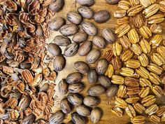 nuts and seeds are shown on a cutting board