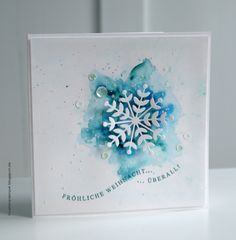 a snowflake card with the words, frolicicle winter greetings